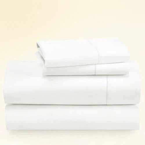 "CinchFit King Sheet Set in ivory white, 400TC cotton. 15-inch deep pocket fitted sheet stays tight on king mattresses."